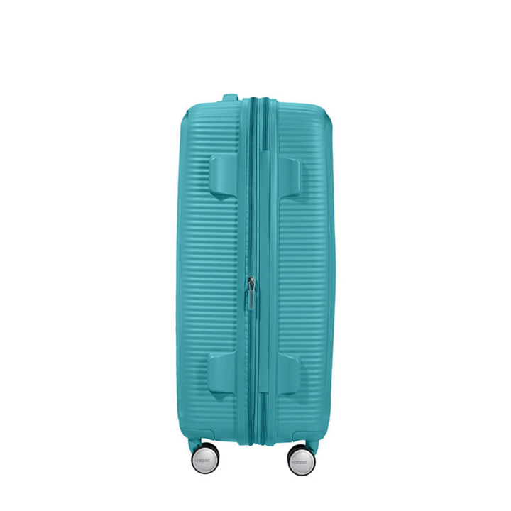 American Tourister Soundbox Spinner 67 Expandable turquoise tonic